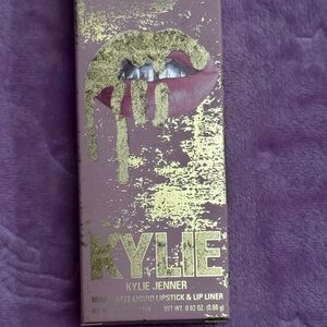 Gold and Purple Reptile Product